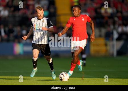 Nottingham Forest's Richie Laryea and Notts County's Sam Austin in action during a pre-season friendly match at Meadow Lane, Nottingham. Picture date: Tuesday July 26, 2022. Stock Photo