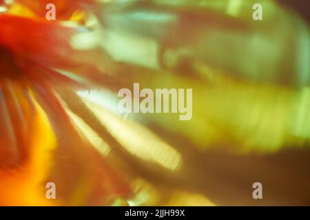 Holographic texture. Mother-of-pearl background. Yellow soft gradient. Rainbow gradient. Neon figures. Cosmic liquid. Yellow holographic texture. High quality photo Stock Photo