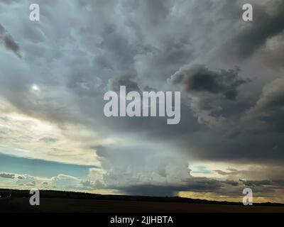 Stormy sky. Large thick dark clouds. Stock Photo