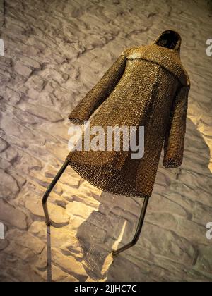 A golden knight armor from European history in the Castle of Counts, Gent, Belgium. Stock Photo