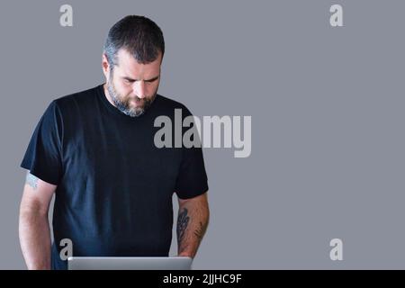 Add your own text to this image of a System Administrator working on an issue. Stock Photo