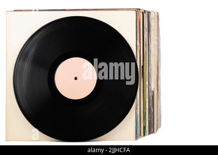 A stack of records on a white background, one in front. Copy space. Stock Photo