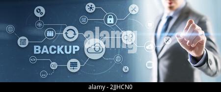 Backup Storage Data Technology concept. Businessman touching Backup Stock Photo