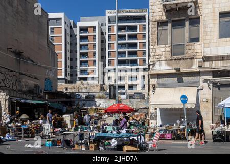 Haifa, Israel - 20 July 2022, Scene of the flea market, with sellers and shoppers, in downtown Haifa, Israel Stock Photo