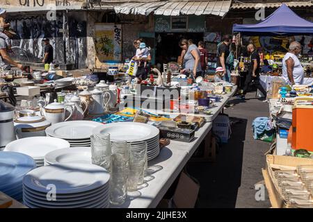 Haifa, Israel - 20 July 2022, Scene of the flea market, with sellers and shoppers, in downtown Haifa, Israel Stock Photo