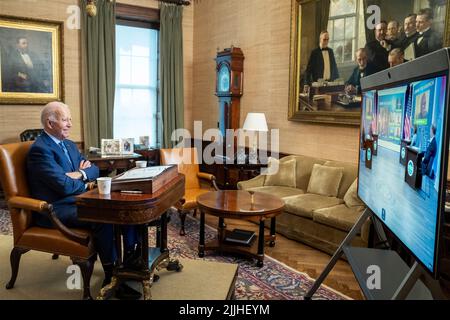 Washington, United States Of America. 26th July, 2022. Washington, United States of America. 26 July, 2022. U.S President Joe Biden, takes part in a video conference on the passing of the bipartisan CHIPS Act as he continues to quarantine after testing positive for COVID-19, at his private office in the residence of the White House, July 26, 2022, in Washington, DC The CHIPS act will boost the US semiconductor industry with $52 billion dollars in government funding. Credit: Adam Schultz/White House Photo/Alamy Live News Stock Photo