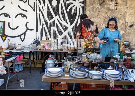 Haifa, Israel - 20 July 2022, Scene of the flea market, with sellers and shoppers, in downtown Haifa, Israel Stock Photo