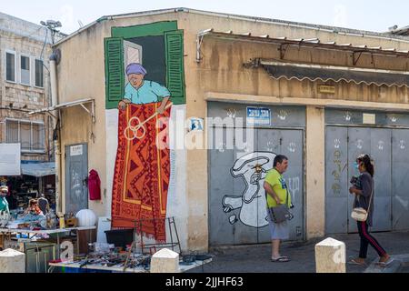 Haifa, Israel - 20 July 2022, Scene of the flea market, with sellers and shoppers, in downtown Haifa, Israel Stock Photo