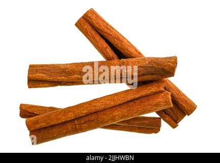 Cinnamon is a spice made from the inner bark of trees scientifically known as Cinnamomum Cinnamon sticks are the rolled inner bark strips that curl in Stock Photo