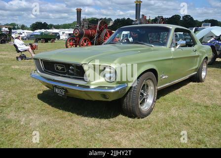 A 1968 Ford Mustang parked on display at the 47th Historic Vehicle Gathering classic car show, Powderham, Devon, England, UK. Stock Photo