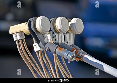 multi-feed satellite antenna with multiple feeds (converters) closeup, modern telecommunication diversity Stock Photo