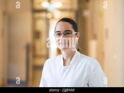 22 July 2022, Hessen, Frankfurt/Main: Maria Vehreschild, head of infectious diseases at Frankfurt University Hospital, is standing in the hallway of one of the buildings. Together with a colleague, she is also head of the Long Covid Outpatient Clinic. (to dpa: 'Long waiting lists for patients with Covid late effects in Hesse') Photo: Frank Rumpenhorst/dpa Stock Photo