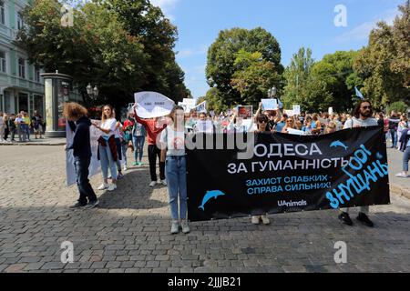 Odessa, Ukraine. 5th Sep, 2021. Participants hold a banner saying ''Odessa for humanity. Protecting the weak is the business of the strong'' during the rally. The All-Ukrainian March for Animal Rights took place across the country. The event was held simultaneously in 30 cities of Ukraine. Activists took to the streets to protest the cruel treatment, killings and use of animals in circuses, commercial photo shoots, and entertainment. Activists and animal owners from Kharkiv, Mykolaiv, Rivne, Kherson, Cherkasy, Kropyvnytskyi, Odessa and other cities took part in the action. Polar explorers Stock Photo