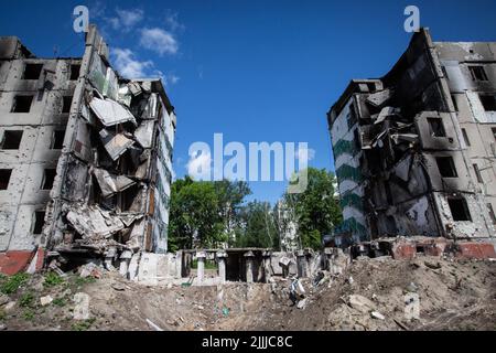 Borodianka, Ukraine. 28th May, 2022. People rest by the river after the ...