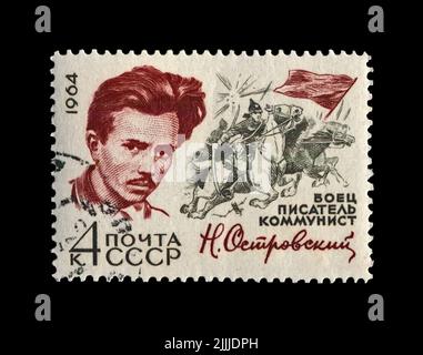 Nikolai Ostrovsky (1904-1936), famous russian writer, commissar, circa 1971. canceled stamp printed in the USSR Stock Photo