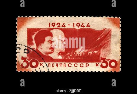 Vladimir Lenin and Joseph Stalin, famous soviet politician leaders, canceled postal stamp printed in USSR (Soviet Union) Stock Photo