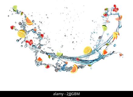 Different flying fruits and splash of water on white background Stock Photo