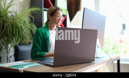 Office workplace interior with laptop and pc Stock Photo