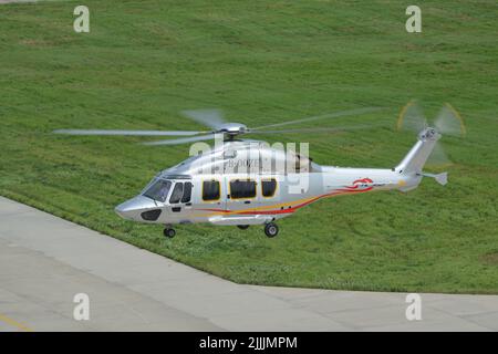 (220727) -- HARBIN, July 27, 2022 (Xinhua) -- Photo taken on July 26, 2022 shows a Z15 (AC352) helicopter in Harbin, northeast China's Heilongjiang Province. The Civil Aviation Administration of China (CAAC) on Tuesday granted certification to the Z15 helicopter, the country's first homegrown, medium-sized helicopter model, for civil use. Z15, also known as AC352, was developed by AVIC Harbin Aircraft Industry Group Co., Ltd. under a cooperation program between AVIC and Airbus Helicopters. It can carry up to 16 passengers with a 7.5-tonne maximum take-off weight and a maximum range of 850 Stock Photo