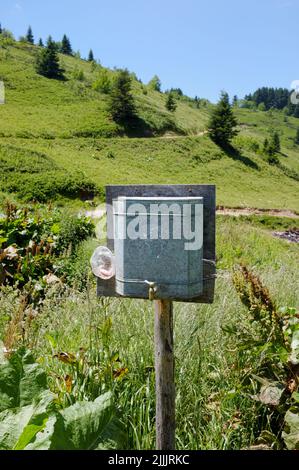 old water dispenser with brass faucet in Biogradska Gora National Park of Montenegro Stock Photo