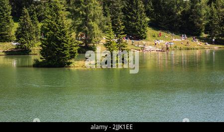 Lake Tret is among the most beautiful forest lakes of South Tyrol, Italy - Europe. Lake Tret is one of the best-loved places in the Val di Non Valley. Stock Photo
