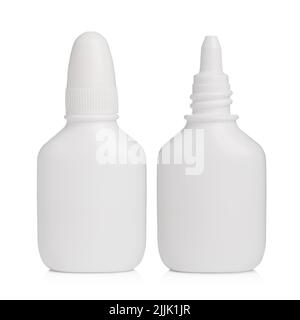 White plastic nasal spray bottle with cup and open, isolated on white background Stock Photo