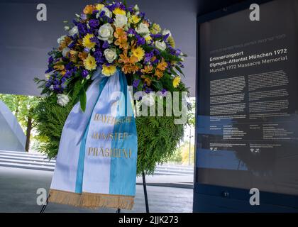 Munich, Germany. 27th July, 2022. At the memorial site for the assassination at the 1972 Olympic Games, there is a wreath of the Bavarian Minister President. Credit: Stefan Puchner/dpa-Pool/dpa/Alamy Live News Stock Photo