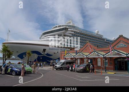 The Emerald Princess cruise ship moored alongside the heritage centre in Cobh, last port of call of the Titanic,  County Cork, Ireland, July 2022 Stock Photo