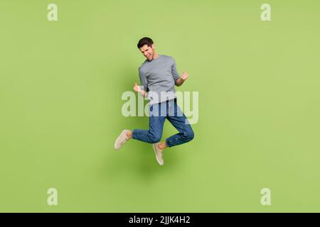 Full Size Photo Of Ecstatic Man Dressed Denim Vest Over T-shirt Riding 