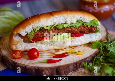 seekh kabab shawarma roll , tomato sauce and drink top view of arabic street food on wooden background Stock Photo