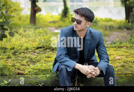 Amazingly looking african american man wear at blue blazer with brooch,  black turtleneck and glasses posed at street. Fashionable black guy.  10497584 Stock Photo at Vecteezy