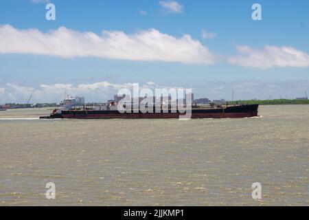 Tanker push barge navigating in Houston ship channel. Push tug, pushing the tanker barge, inland waters of USA. Stock Photo