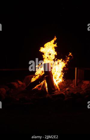 Flames Of Fire And Sparks Isolated On Black Background. Magic Fiery Wallpaper. Abstract Flaming Background. Flying Sparks Background, Closeup View. Bo Stock Photo