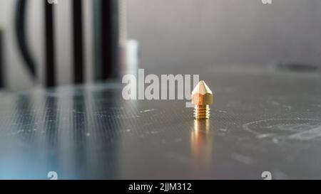 A closeup shot of a 0.4mm nozzle for 3d printer Stock Photo