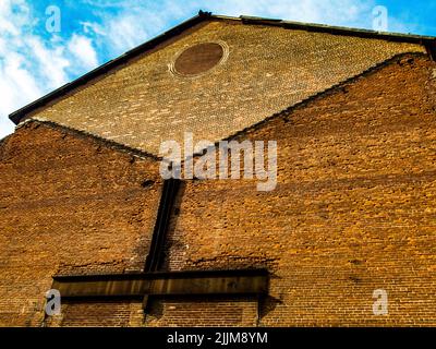 The exterior of an old brick factory building. Stock Photo