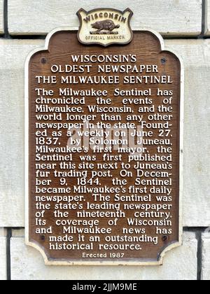 The Milwaukee Sentinel Historic Marker is displayed along the Riverwalk in Milwaukee, Wisconsin Stock Photo