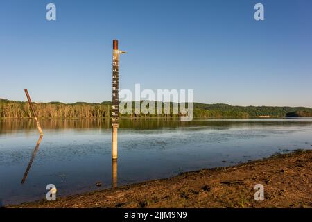 Water level gauge, Mississippi River, Prairie du Chien, USA. This marker allows the water level of the river to be monitored. Stock Photo