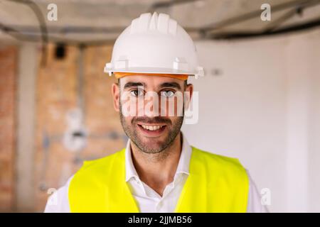 Portrait of confident male architect at construction building site Stock Photo