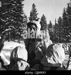 The paratroopers School in Karlsborg 1956. Hunter in winter forest. Stock Photo