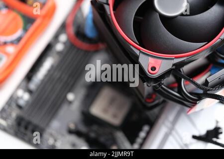Computer fan on background of computer board Stock Photo