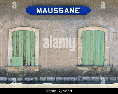 Maussane village sign on an old building, Maussane-les-Alpilles, Bouches-du-Rhone, Provence-Alpes-Cote-d'Azur, France Stock Photo