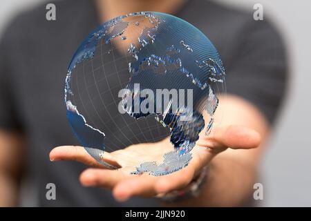 a photo of 3d rendered earth floating over man hands Stock Photo - Alamy
