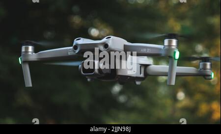 A closeup dji air 2s drone hovering in the air Stock Photo