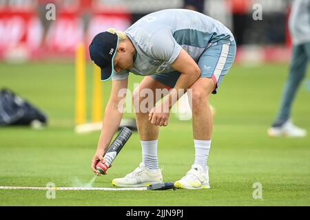 Sam Curran of England marks out his bowling spot during the warmup session Stock Photo