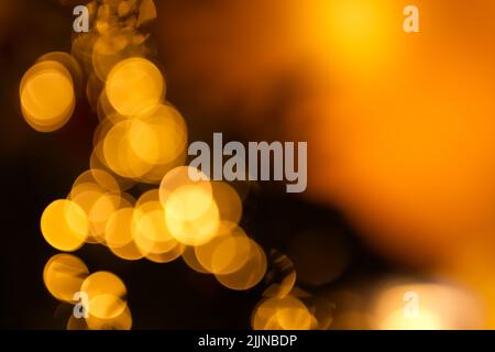 The beautiful orange bokeh lights background. Stock Photo