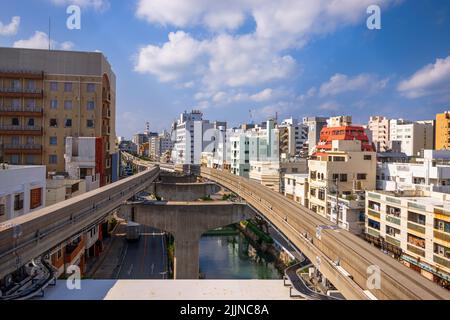 Naha, Okinawa, Japan city skyline from the monorail. Stock Photo