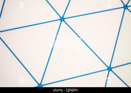 A background of the blue dome's metal structure made with some triangles Stock Photo