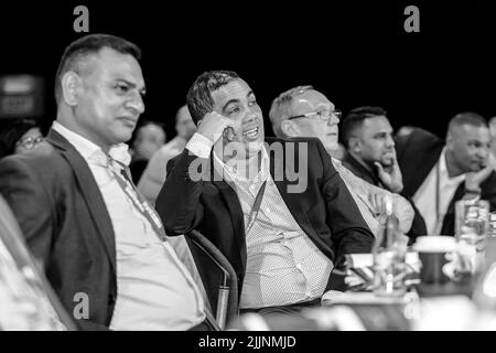 A grayscale shot of delegates at sales convention at a large conference center in Johannesburg, South Africa Stock Photo