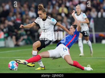 Germany's Lina Magull (left) and France's Charlotte Bilbault battle for the ball during the UEFA Women's Euro 2022 semi-final match at Stadium MK, Milton Keynes. Picture date: Wednesday July 27, 2022. Stock Photo