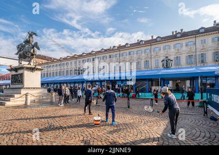 The players playing tennis on the Piazza San Carlo square in Turin Italy Stock Photo